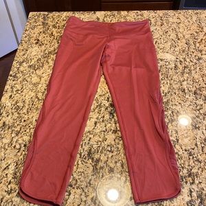 Wine colored Champion leggings. Only worn once. Size Large. Mesh detail.
